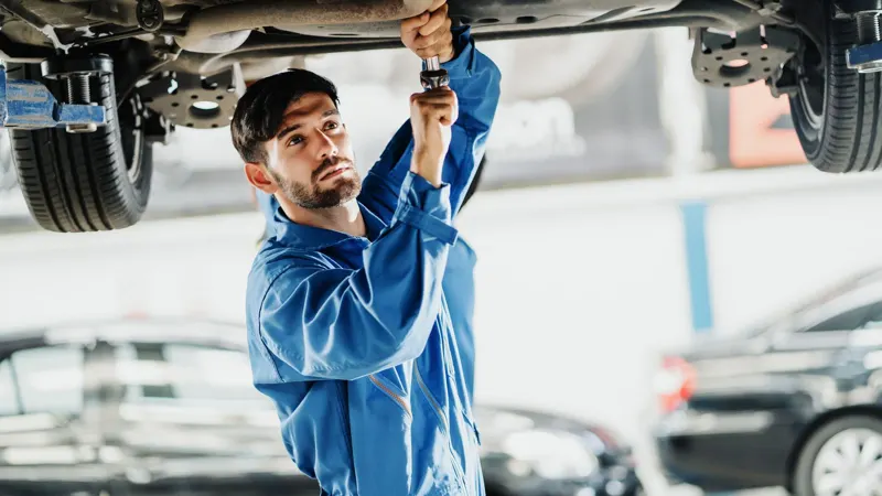 The service bay: a certified technician bills about 130 hours a month